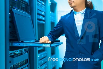 Man Fix Server Network In Data Center Room Stock Photo