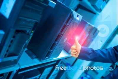 Man Fix Server Network In Data Center Room Stock Photo