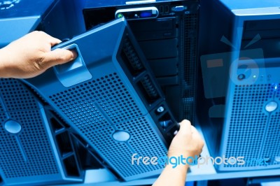 Man Fix Server Network In Data Center Room Stock Photo