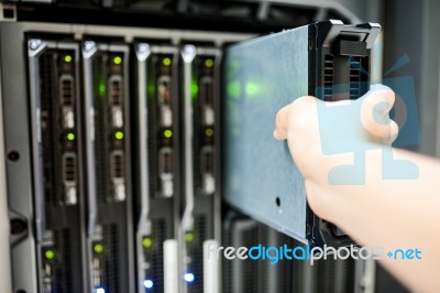 Man Fix Server Network In Data Center Room Stock Photo