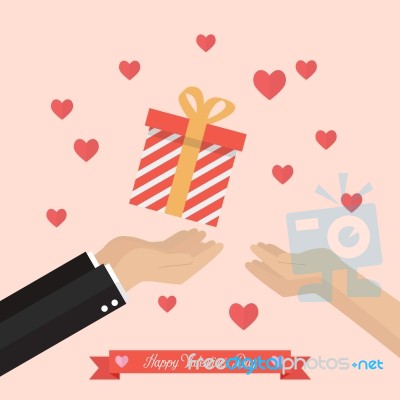 Man Giving Gift Box To A Woman Stock Image