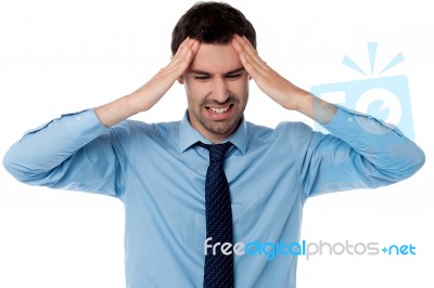Man Having Severe Headache Stock Photo
