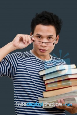 Man Holding Books Stock Photo