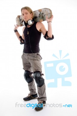 Man Holding Skateboard On His Neck Stock Photo Man Holding Skateboard On His Neck Stock Photo