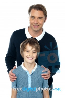 Man In Blue Pullover Posing With His Son Stock Photo Man In Blue Pullover Posing With His Son Stock Photo