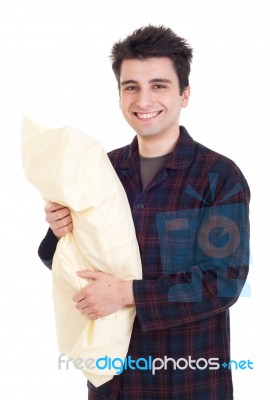 Man In Pajamas Holding Pillow Stock Photo