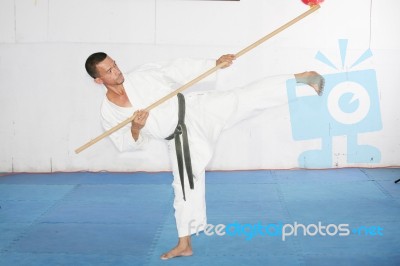 Man In Shotokan Karate With A Bo In His Hands Stock Photo