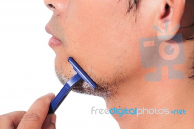 Man Is Shaving Stock Photo