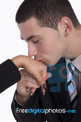 Man Kisses A Hand To Lad Stock Photo