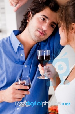 Man Looking His Wife With Wine Stock Photo