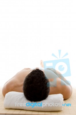Man Lying Down For Spa Treatment Stock Photo