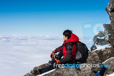 Man On Top Of Mountain,landscape In Winter Stock Photo