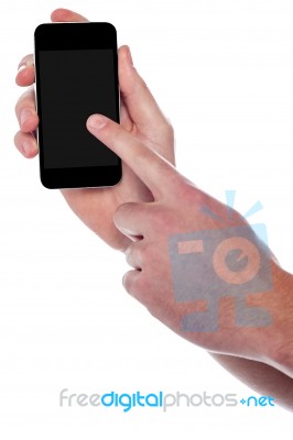 Man Pointing On His Smartphone Display Stock Photo
