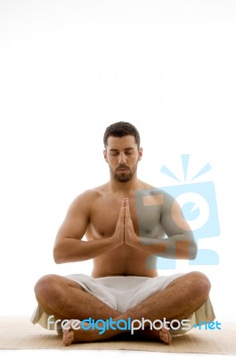 Man Practicing Yoga Stock Photo