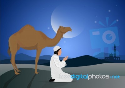 Man Praying And Camel With Full Moon Background Stock Image