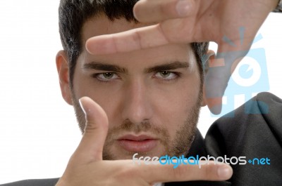 Man Showing Framing Hand Gesture Stock Photo