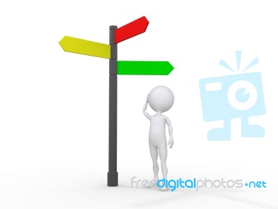 Man Standing Under Direction Board Stock Image