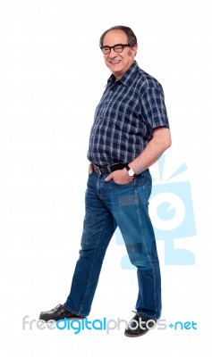 Man Standing With Hands In Pocket Stock Photo