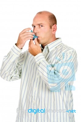 Man Take Asthma Inhaler Stock Photo