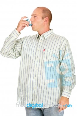 Man Using Asthma Pump Stock Photo