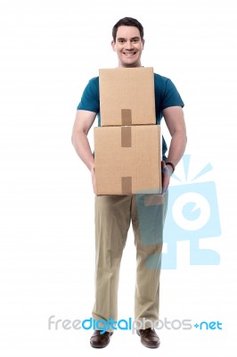 Man With A Cardboard Box In Hand Stock Photo