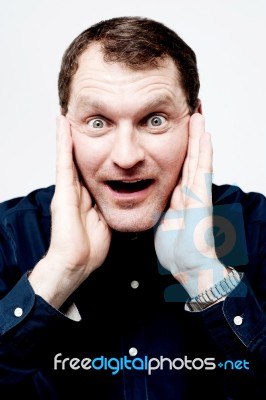 Man With Astonished Expression Stock Photo