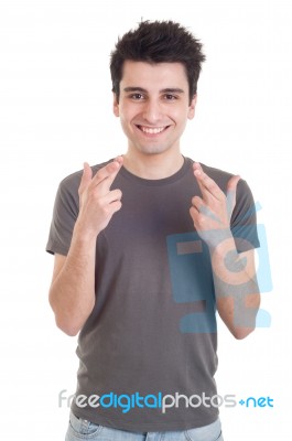 Man With Crossed Fingers Stock Photo