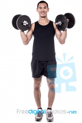 Man With Dumbbells Isolated On White Stock Photo