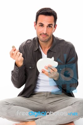 Man With Money And Piggy Bank Stock Photo