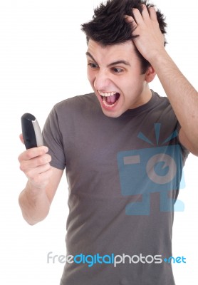 Man Yelling Into Mobile Stock Photo