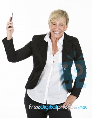 Manager Woman Holding A Smartphone Stock Photo