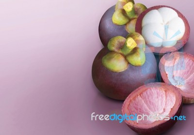 Mangosteen On Purple Solid Background Stock Photo