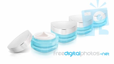 Many Blue Triangle Cosmetic Jar On White Background Stock Photo