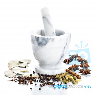 Marble Mortar And Pestle With Assorted Spices On White Backgroun… Stock Photo