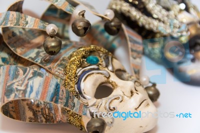 Masks And Feathers Of Venice Carnival On White Background Stock Photo