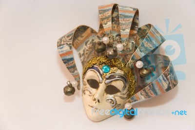 Masks And Feathers Of Venice Carnival On White Background Stock Photo