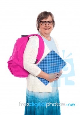 Mature Student With Bag And Note Stock Photo