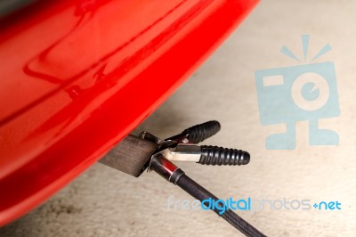 Measuring Exhausts Of A Car In Garage Stock Photo