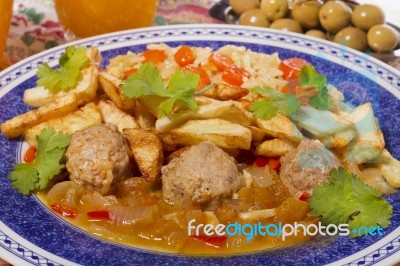 Meat Balls With Rice And Potatoes Stock Photo