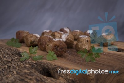 Meatballs On Wooden Cutting Board Stock Photo