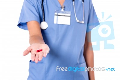 Medical Pills In Doctor's Hand Stock Photo