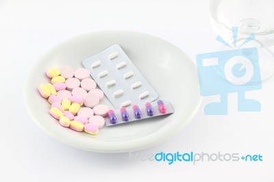 Medicine Tablet Dish On Table Stock Photo