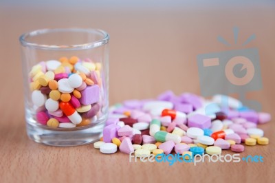 Medicines With Glass Stock Photo