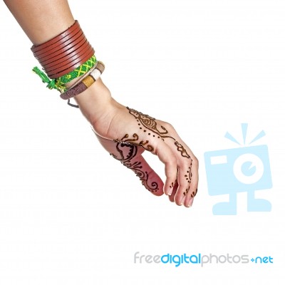 Mehendi Or Henna Tatoo On The Female Hands In Bracelets Isolated… Stock Photo