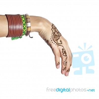 Mehendi Or Henna Tatoo On The Female Hands In Bracelets Isolated… Stock Photo