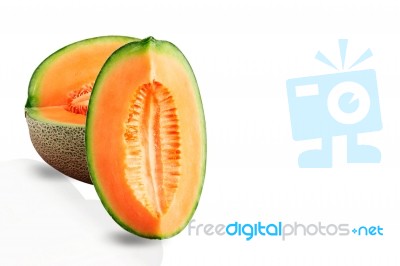 Melon Cut On White Background Stock Photo