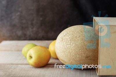 Melon On Wooden Stock Photo