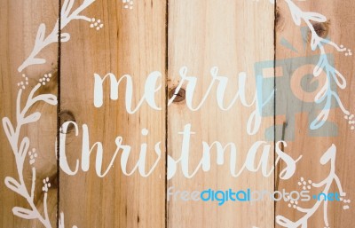 Merry Christmas Written On Sodden Planks Background Stock Photo