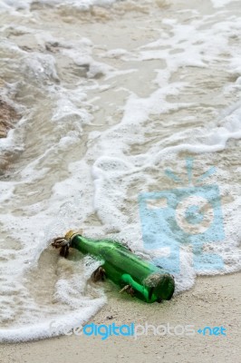 Message In The Bottle Washed Ashore Stock Photo