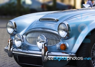 Metallic Blue Sports Car Stock Photo